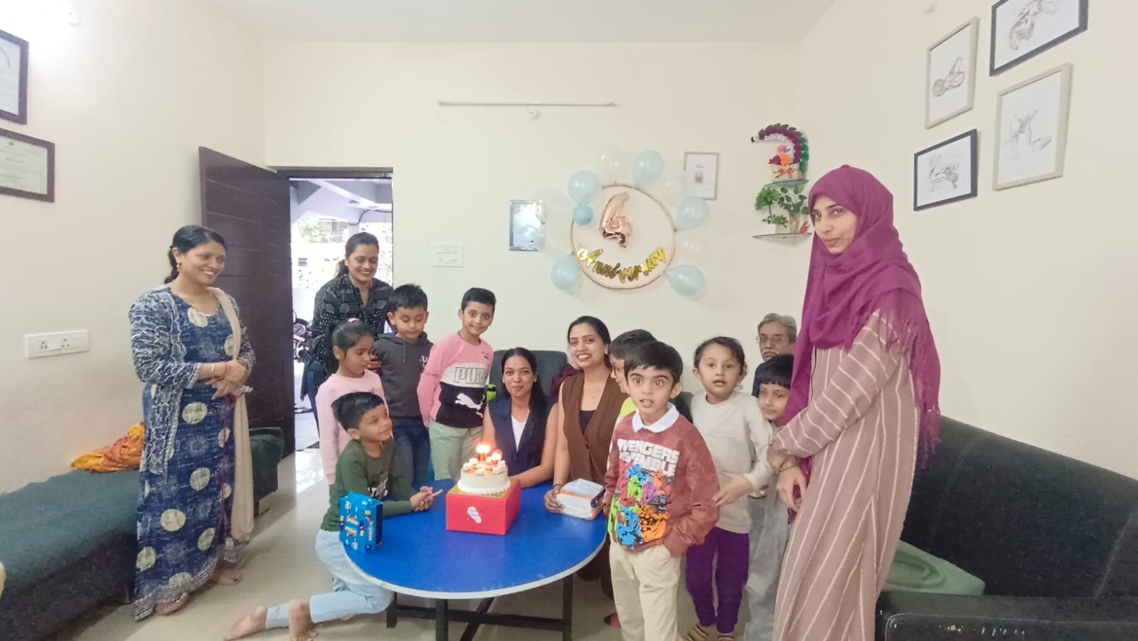 Children and families in the activity center during a celebration