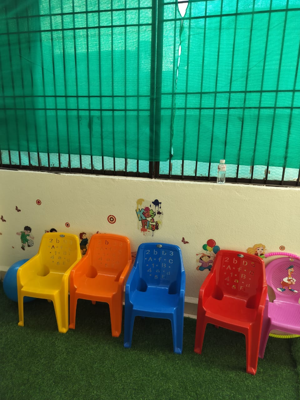 Colorful chairs in the Speech Plus learning area
